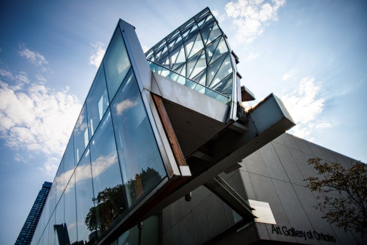 Glass and concrete façade of the Art Gallery of Ontario.