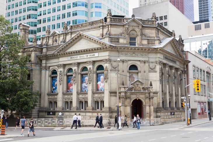 The exterior of the Hockey Hall of Fame in daylight.