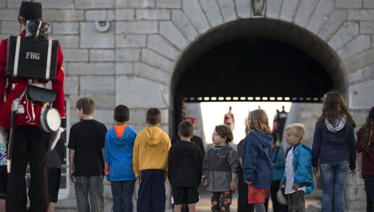 Children line up at Fort Henry.