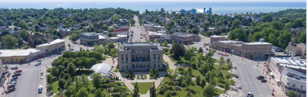 Goderich Square in the middle and streets on either side with trees all around