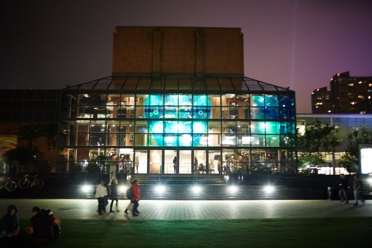 The lights inside Harbourfront Centre glow bright at night. 