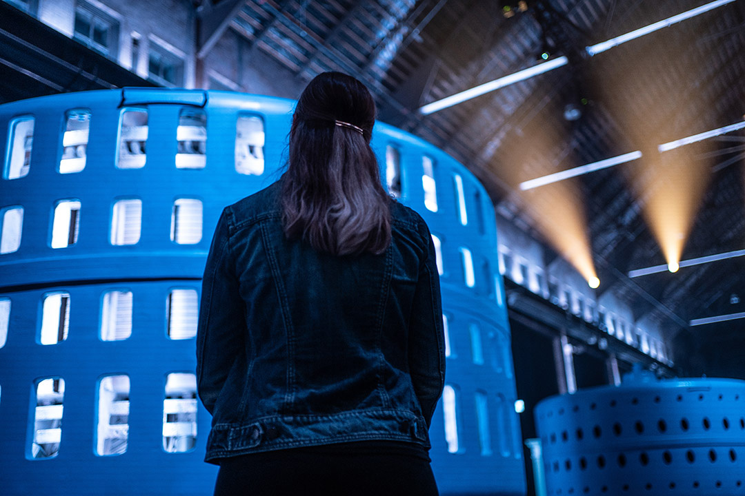 A woman looking at an exhibit