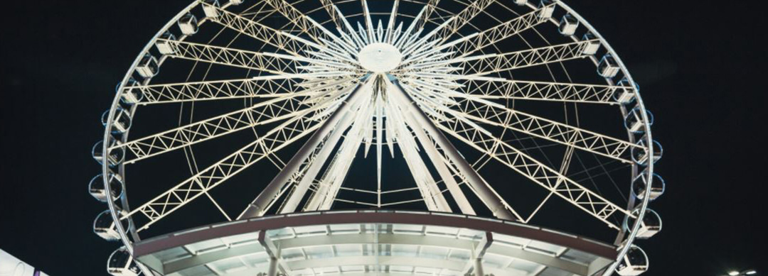 Giant white Skywheel glowing in the dark sky on Clifton Hill