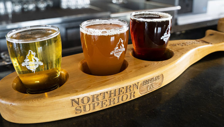 A beer flight featuring three beers