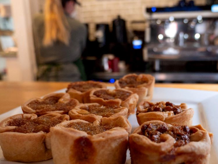 Delicious butter tarts from the oven on the counter at the Nutty Bean café.