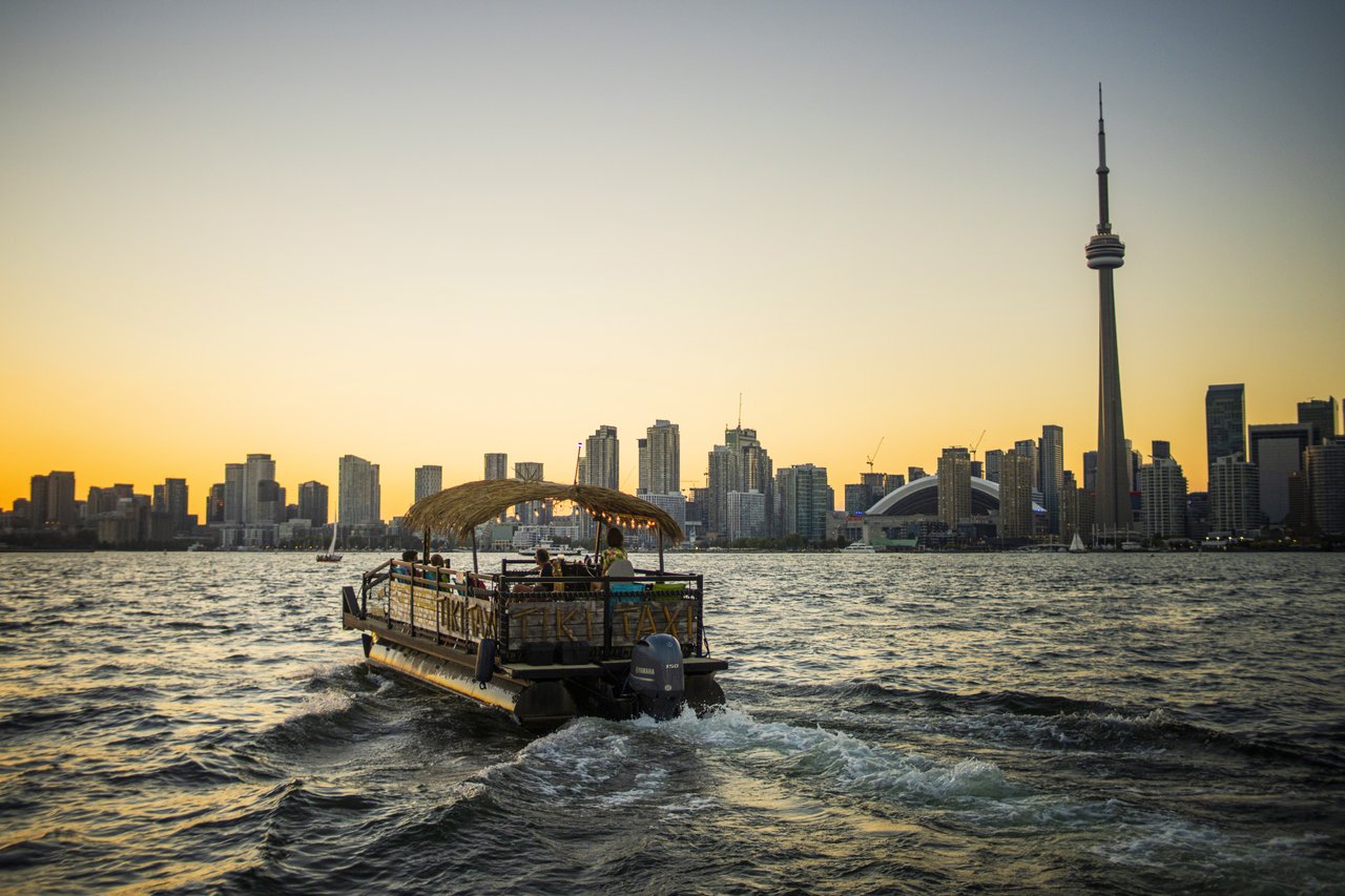 Tiki boat on Lake Ontario going towards downtown Toronto