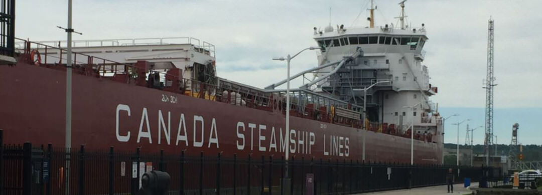 Giant Canadian Steamships Line ship parked in the Welland Canal