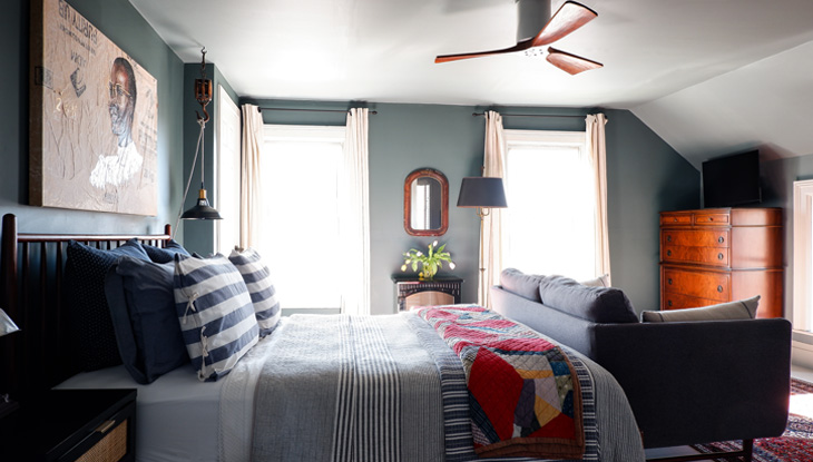 A bed in a farmhouse suite